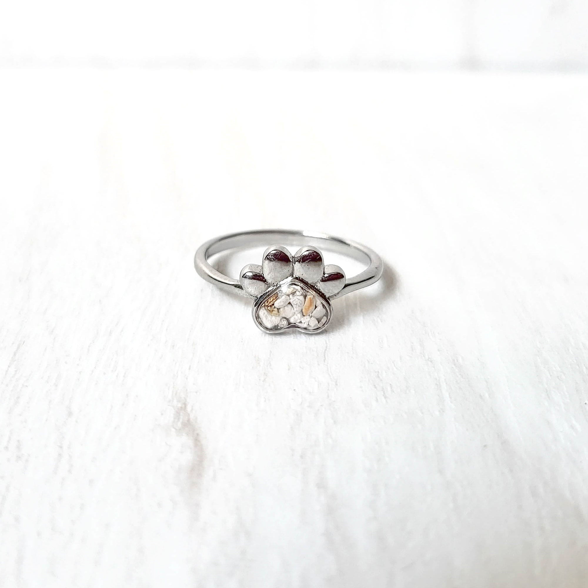 Paw shaped engagement ring top